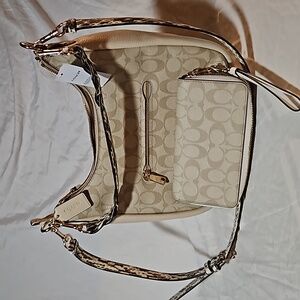 Coach Leather and Khaki Purse and wallet.